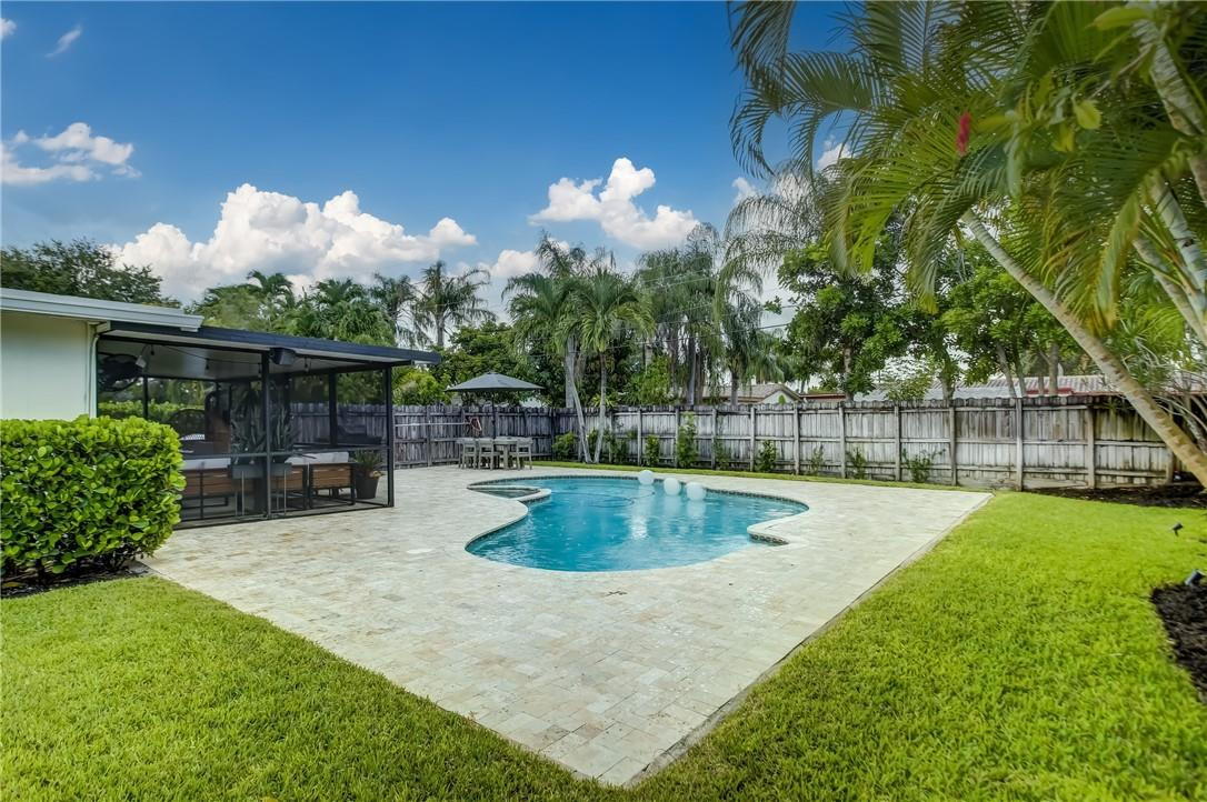 4117 McKinley Street Hollywood, FL 33021 - Photo 47 of 52 a view of a backyard with swimming pool