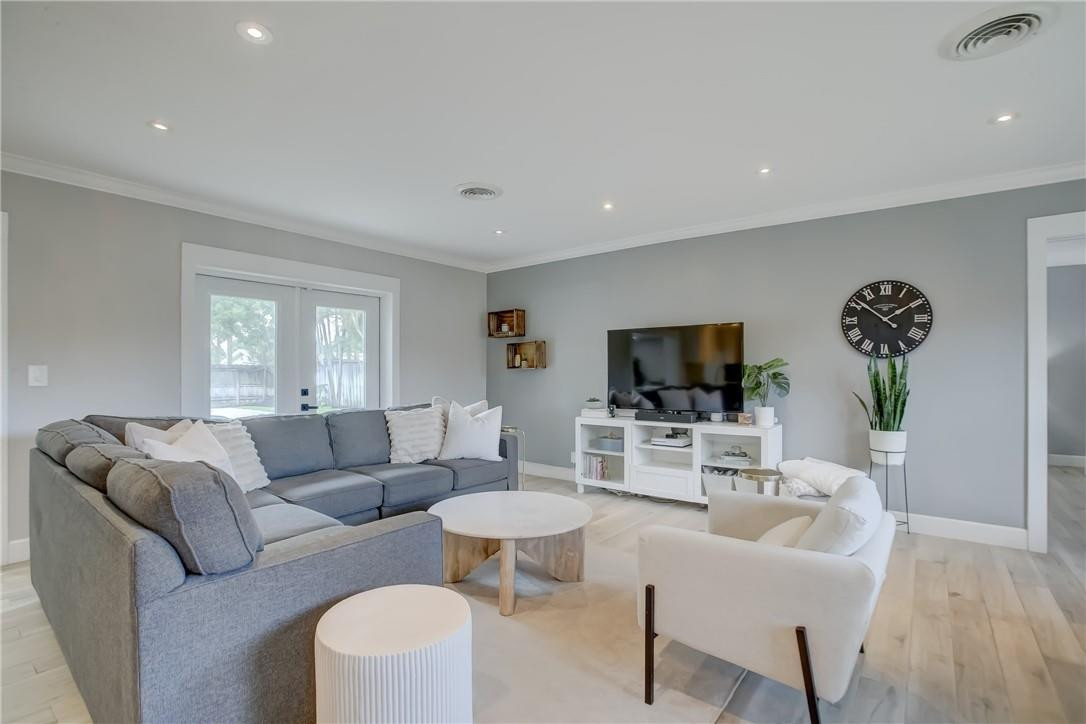 4117 McKinley Street Hollywood, FL 33021 - Photo 5 of 52 a living room with furniture and a flat screen tv