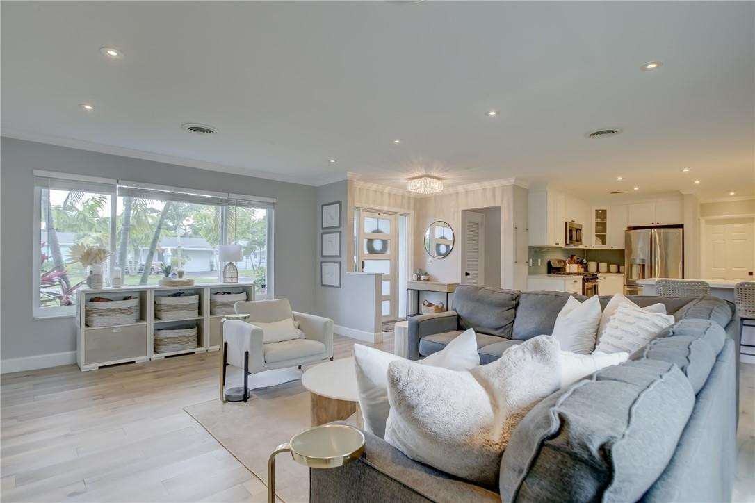 4117 McKinley Street Hollywood, FL 33021 - Photo 7 of 52 a living room with furniture and a large window