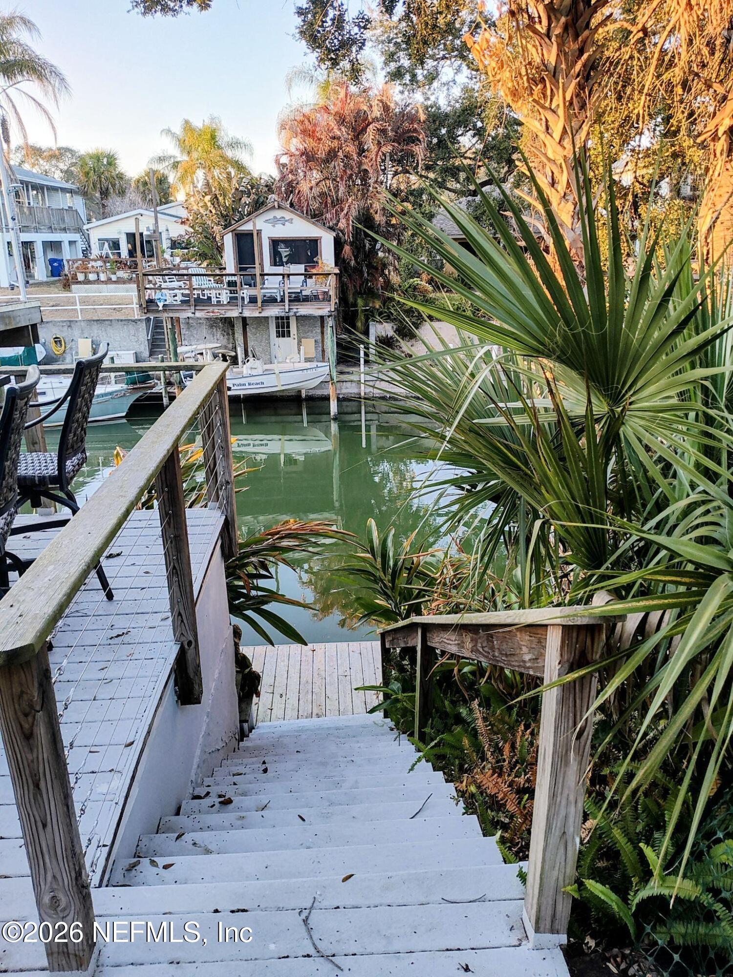 137 Lewis Street Edgewater, FL 32141 - Photo 24 of 42 a balcony with view of lake