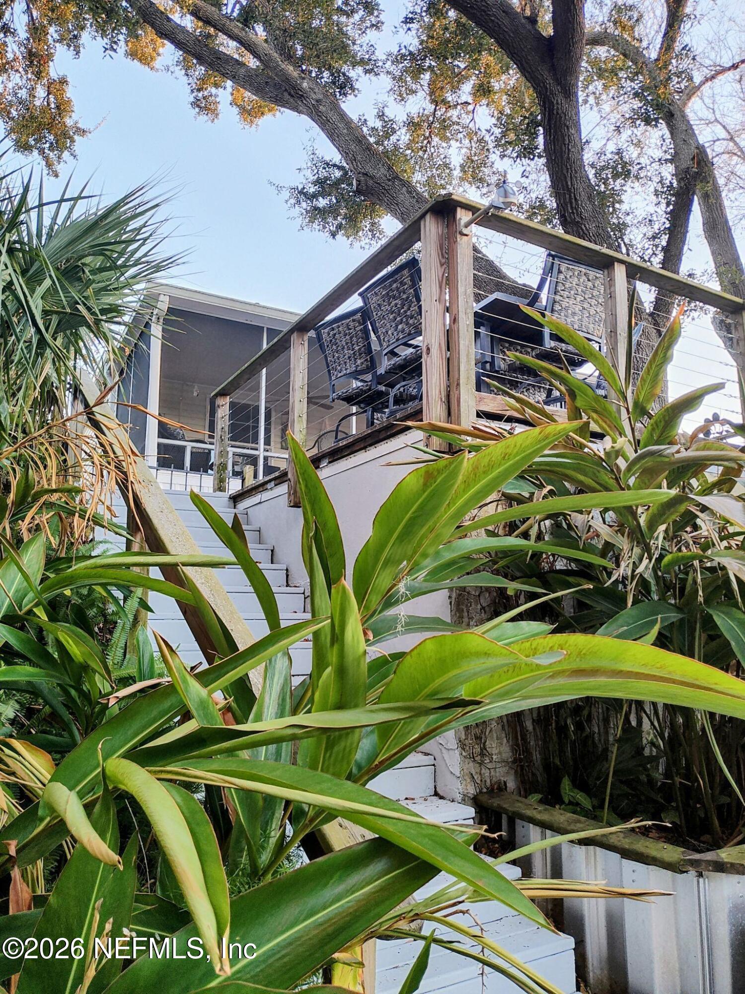 137 Lewis Street Edgewater, FL 32141 - Photo 26 of 42 a view of a house with a yard