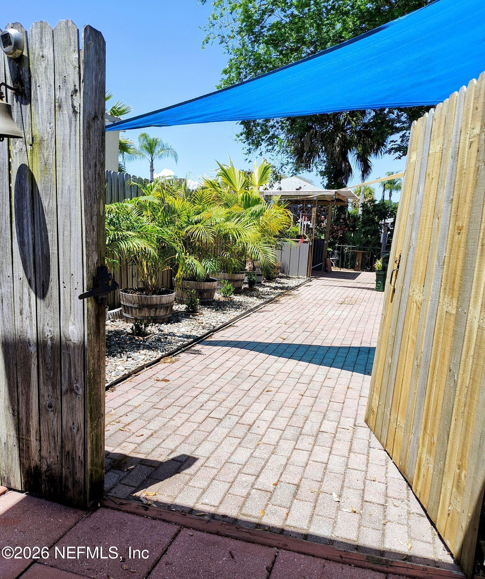137 Lewis Street Edgewater, FL 32141 - Photo 28 of 42 a view of a backyard with sitting area