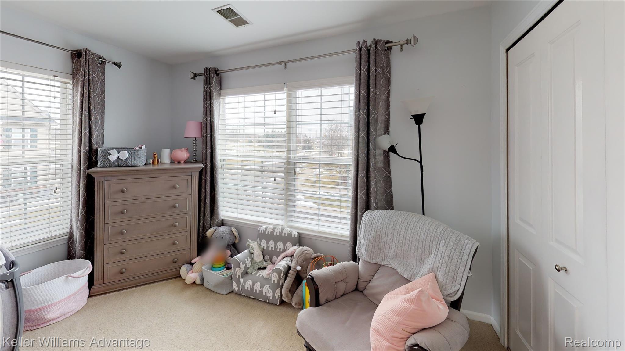 4057 Hampton Ridge Boulevard Howell, MI 48843 - Photo 20 of 25 4057-Hampton-Ridge-Blvd-Bedroom(2).jpg
