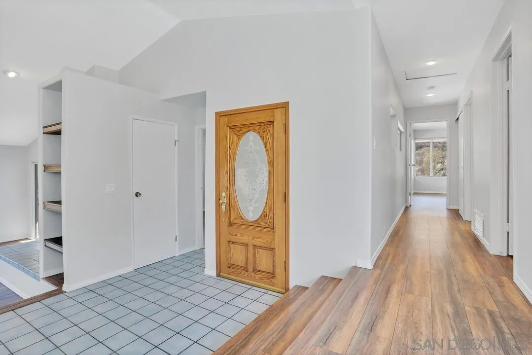 12040 Rocoso Road Lakeside, CA 92040 - Photo 11 of 56 a view of a room with wooden floor and entryway