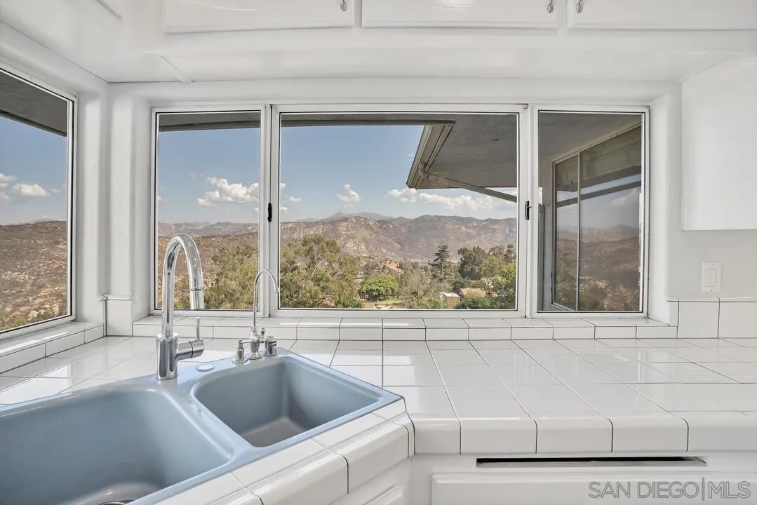 12040 Rocoso Road Lakeside, CA 92040 - Photo 18 of 56 a view of a sink and a window