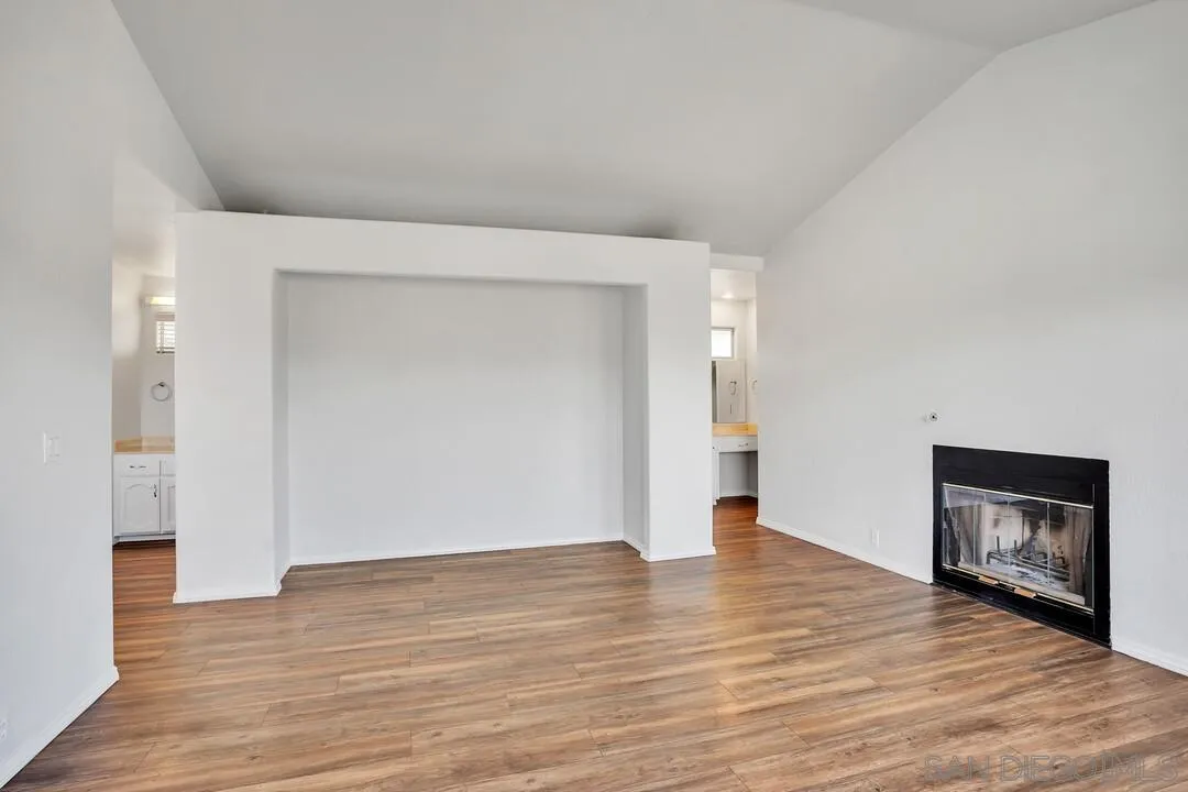 12040 Rocoso Road Lakeside, CA 92040 - Photo 26 of 56 a view of an empty room with wooden floor and a window