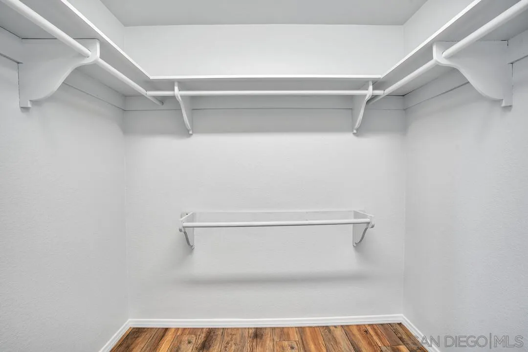 12040 Rocoso Road Lakeside, CA 92040 - Photo 28 of 56 a view of walk in closet with empty racks
