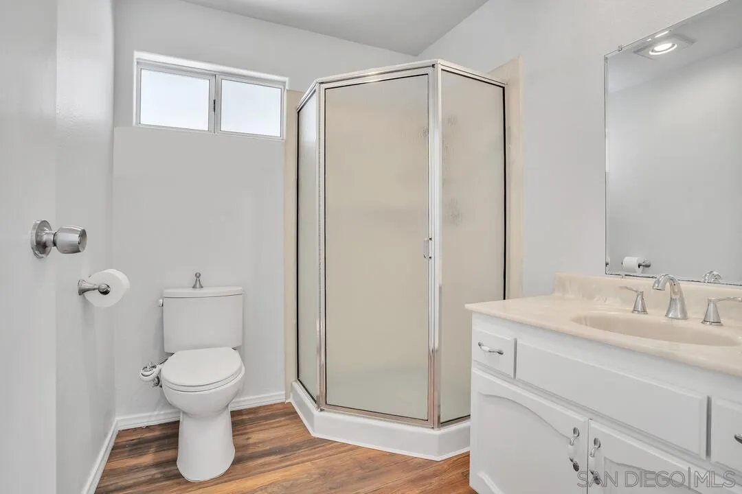12040 Rocoso Road Lakeside, CA 92040 - Photo 33 of 56 a bathroom with a shower a toilet and a sink