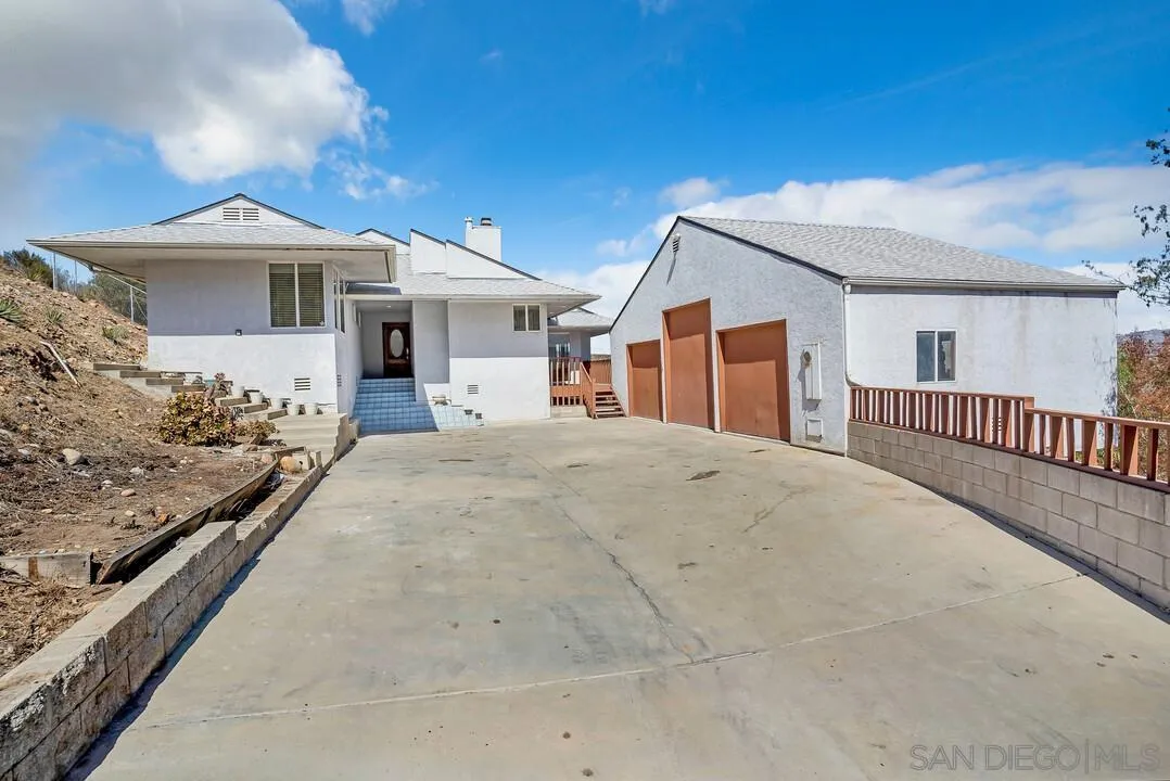 12040 Rocoso Road Lakeside, CA 92040 - Photo 48 of 56 a view of a house with a yard