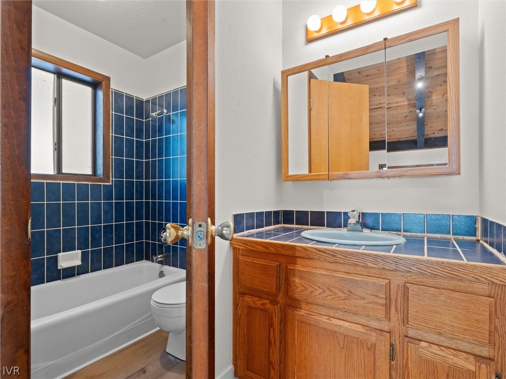 1106 Altdorf Terrace Incline Village, NV 89451 - Photo 25 of 50 a bathroom with a sink and bathtub