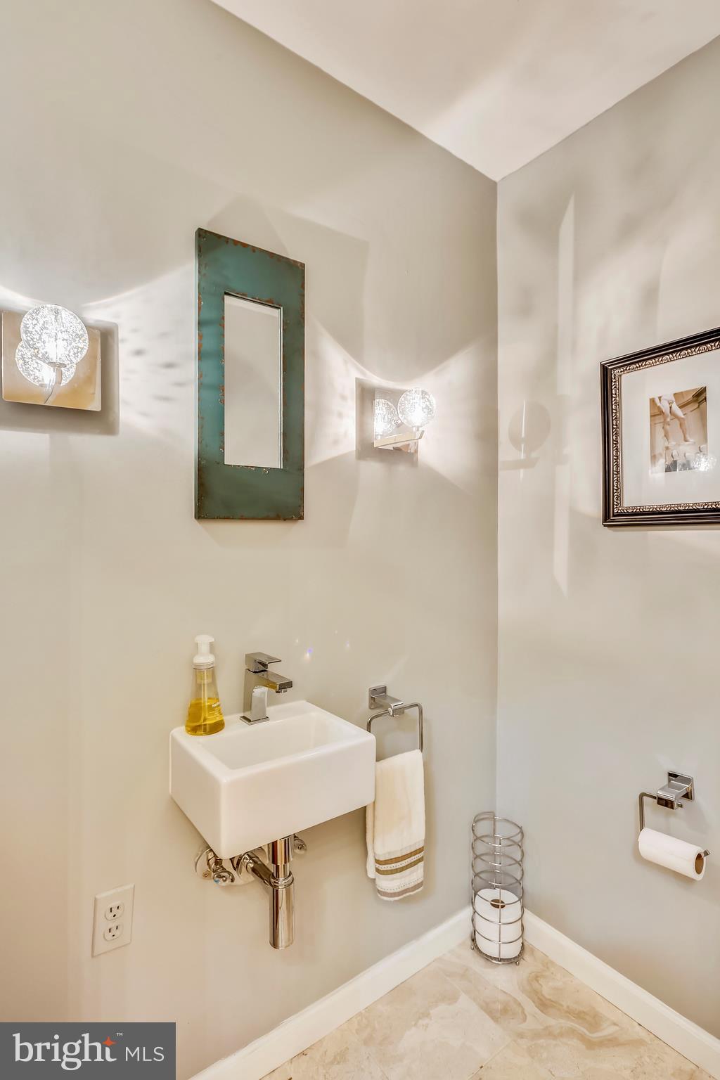 9420 Brink Road Laytonsville, MD 20882 - Photo 36 of 97 First powder room is adjacent to the foyer