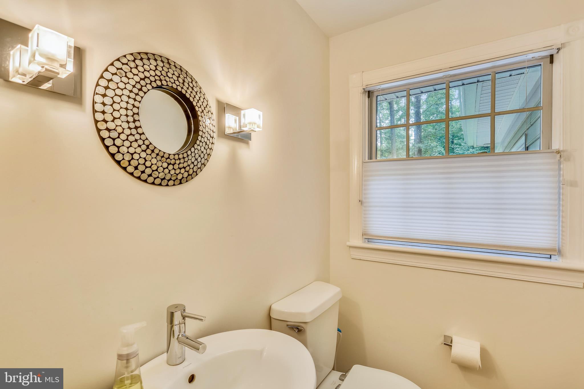 9420 Brink Road Laytonsville, MD 20882 - Photo 39 of 97 2nd powder room is between the garage & mud room