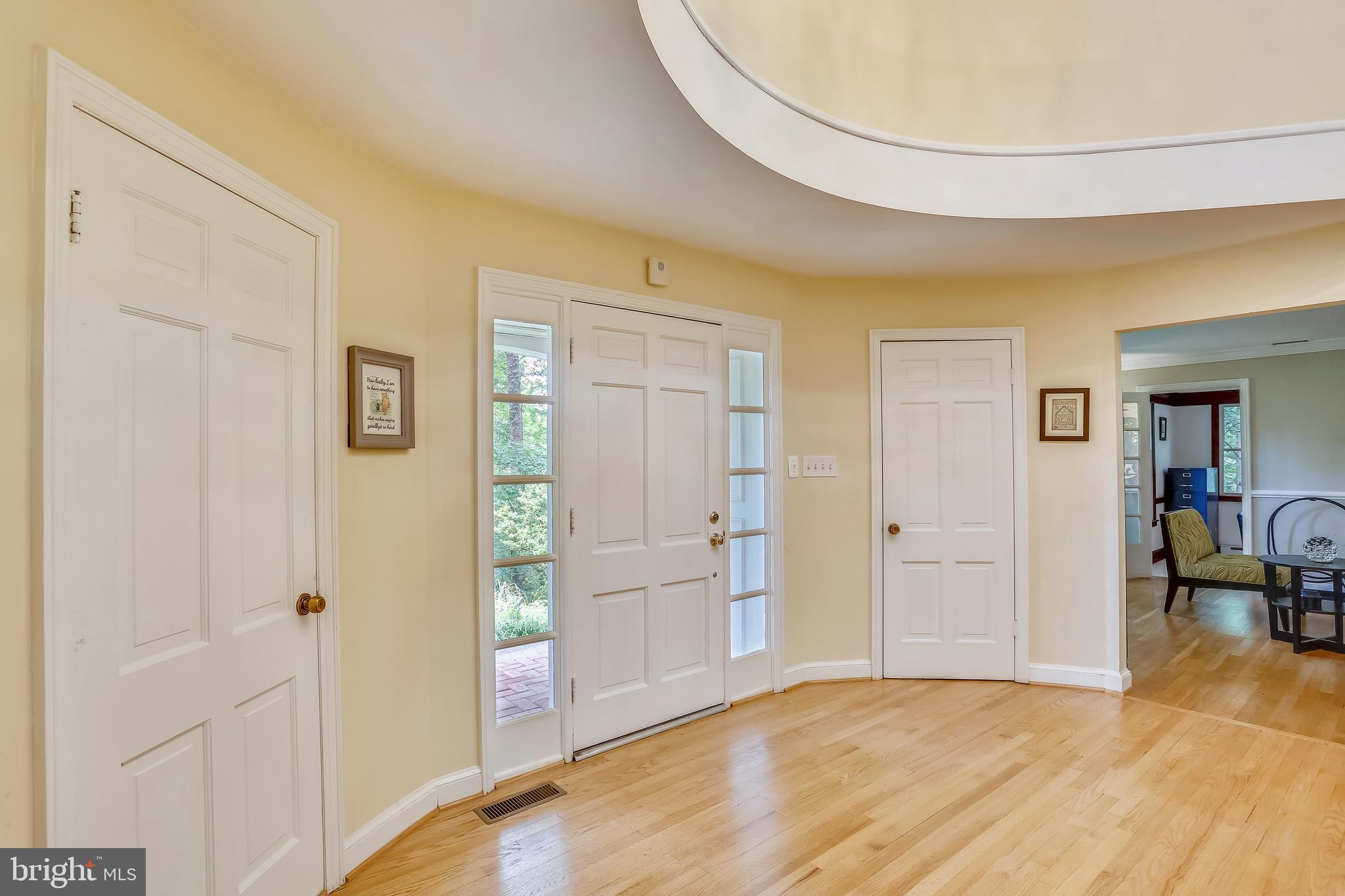 9420 Brink Road Laytonsville, MD 20882 - Photo 5 of 97 Oval foyer with refinished oak hardwood floor