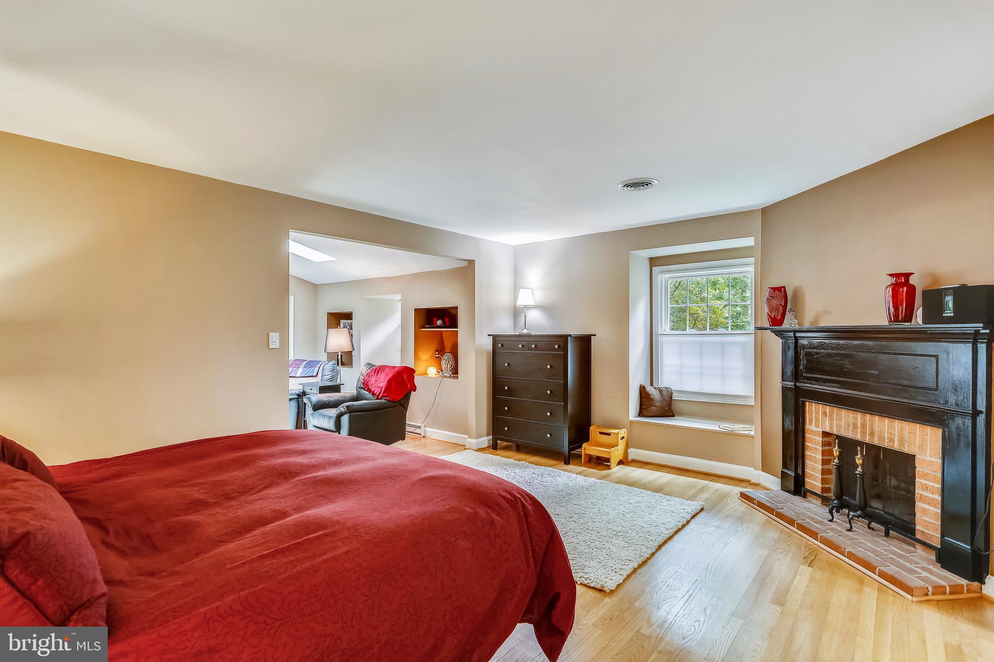 9420 Brink Road Laytonsville, MD 20882 - Photo 45 of 97 Master bedroom with a wood-burning fireplace
