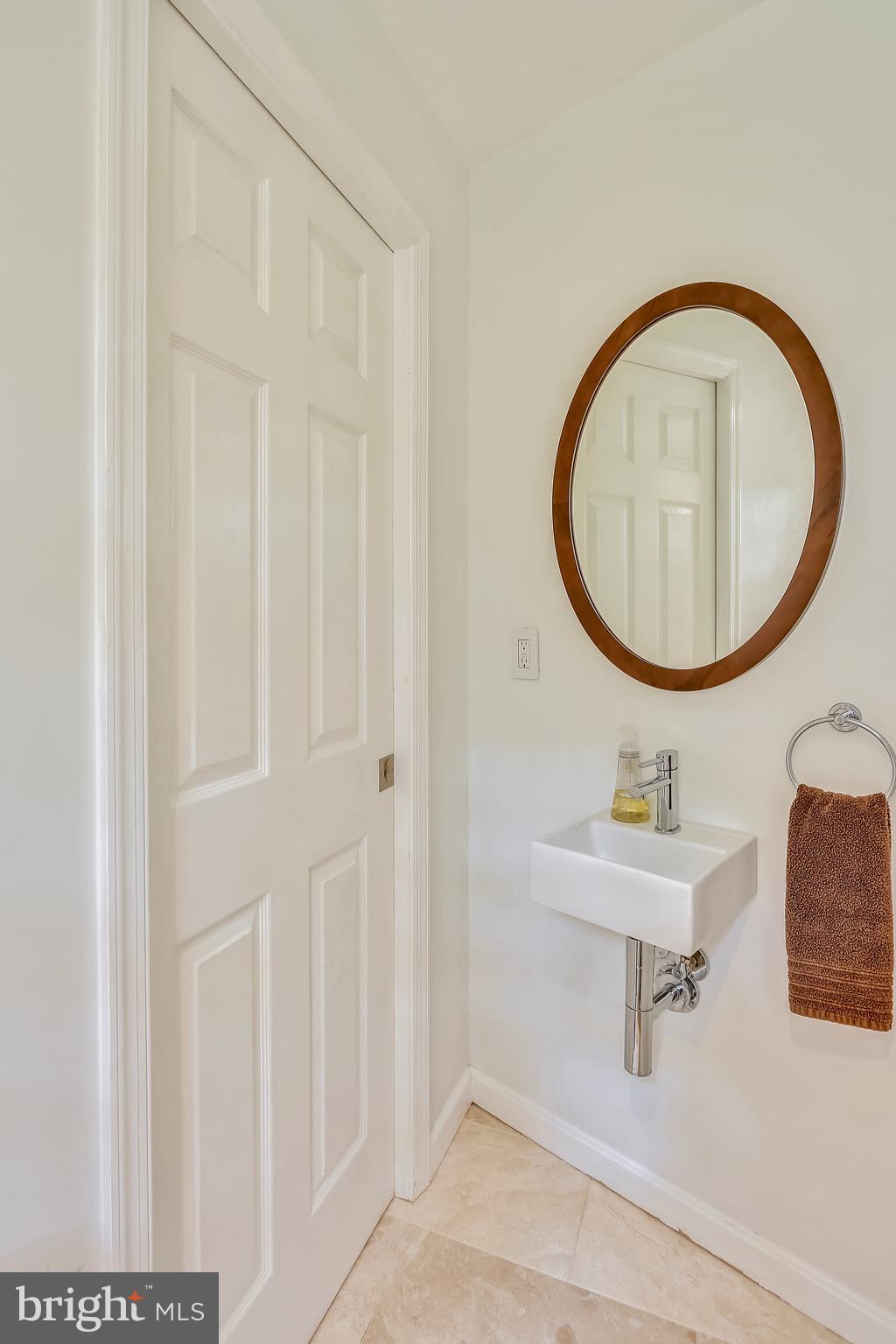 9420 Brink Road Laytonsville, MD 20882 - Photo 53 of 97 Water closet with a small sink in master bathroom