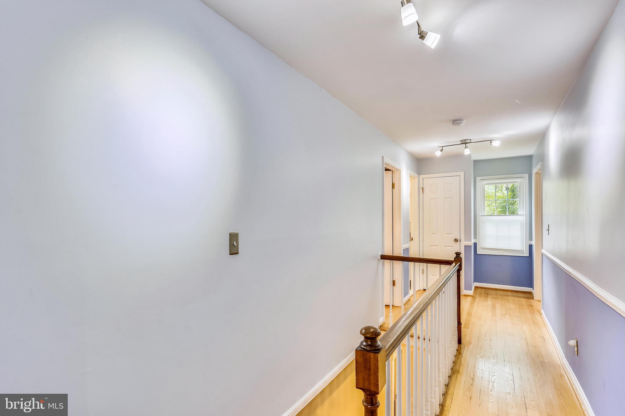 9420 Brink Road Laytonsville, MD 20882 - Photo 58 of 97 Upstairs hall way has refinished hardwood floor
