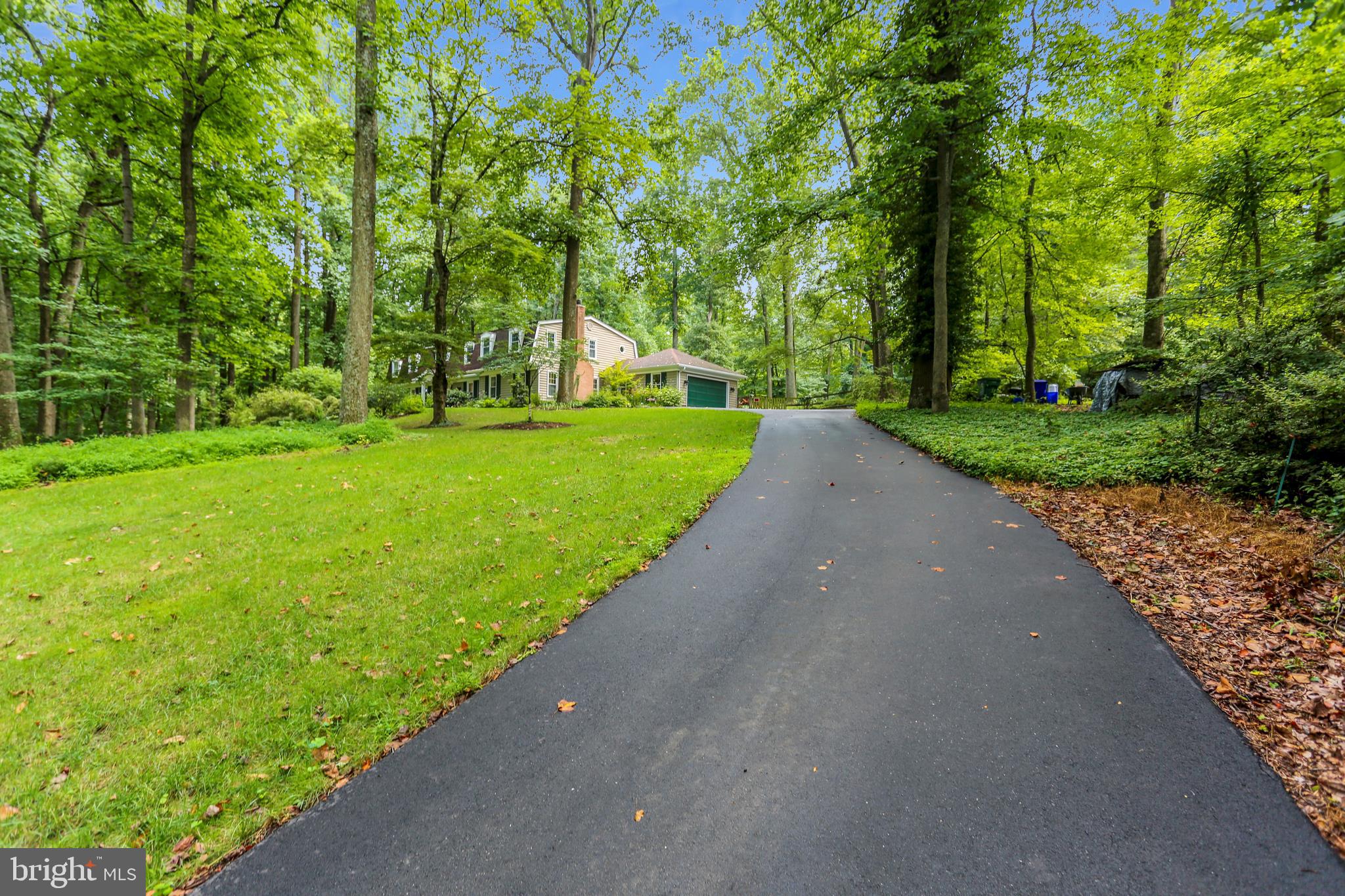 9420 Brink Road Laytonsville, MD 20882 - Photo 83 of 97 Refinished driveway leads to the 2-car garage
