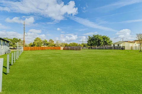 a view of a golf course with a garden