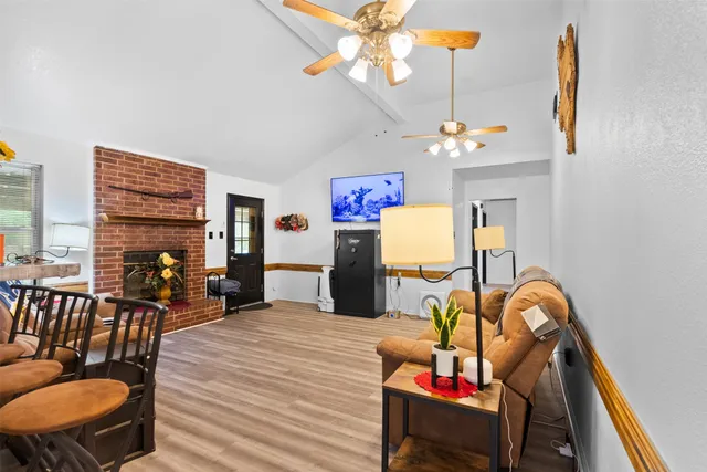 a kitchen with a sink appliances and cabinets