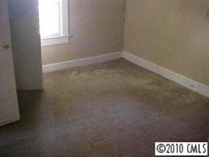 3916 Plainview Road Charlotte, NC 28208 - Photo 5 of 8 a view of an empty room and a window