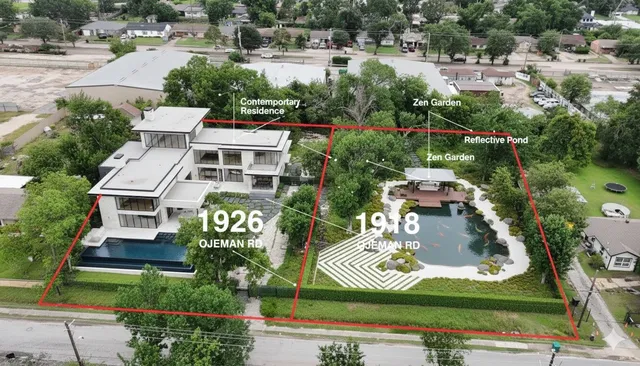 an aerial view of multiple houses with yard