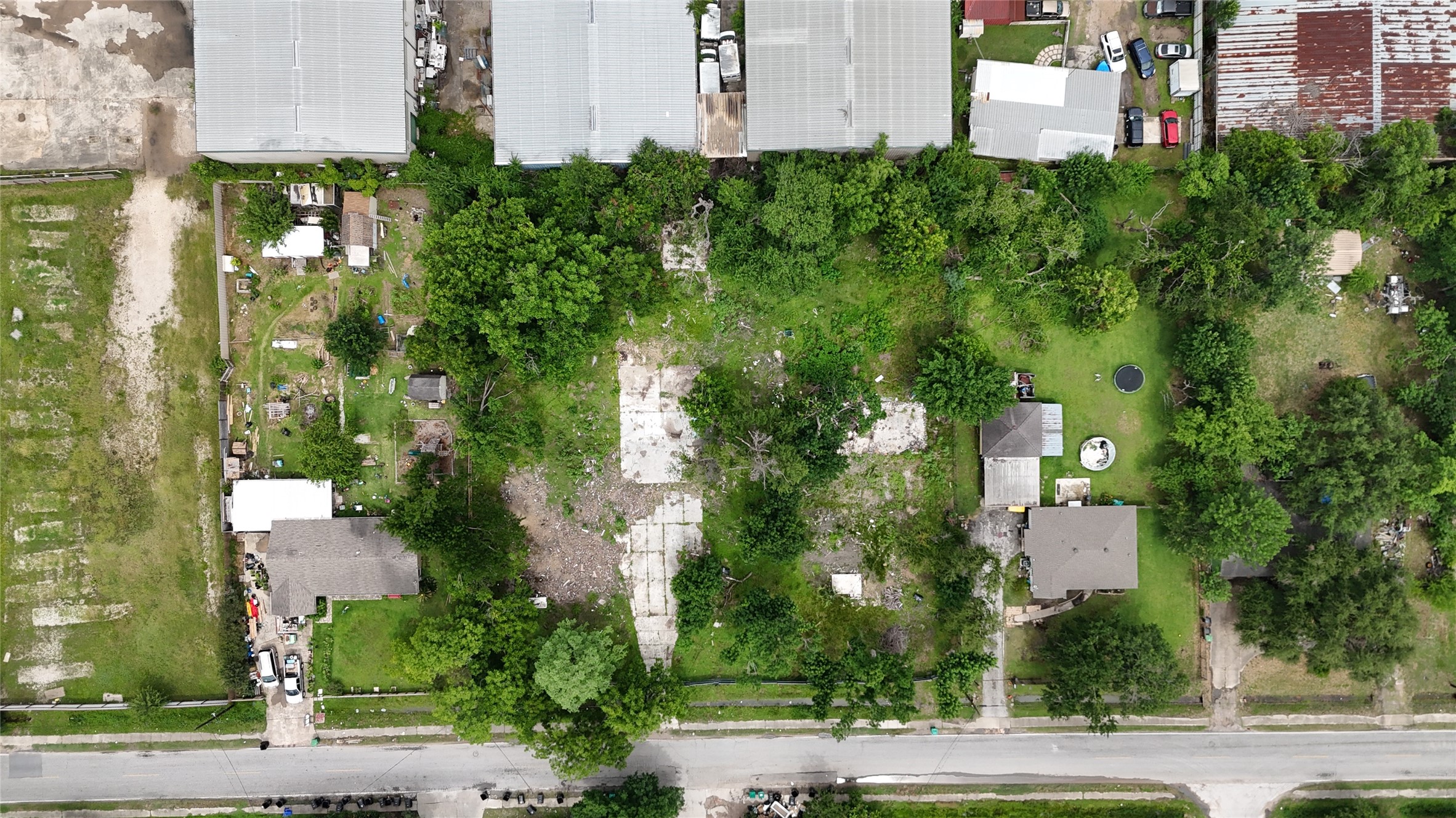 1926 Ojeman Road Houston, TX 77080 - Photo 13 of 22 an aerial view of a residential apartment building with a yard and parking spaces