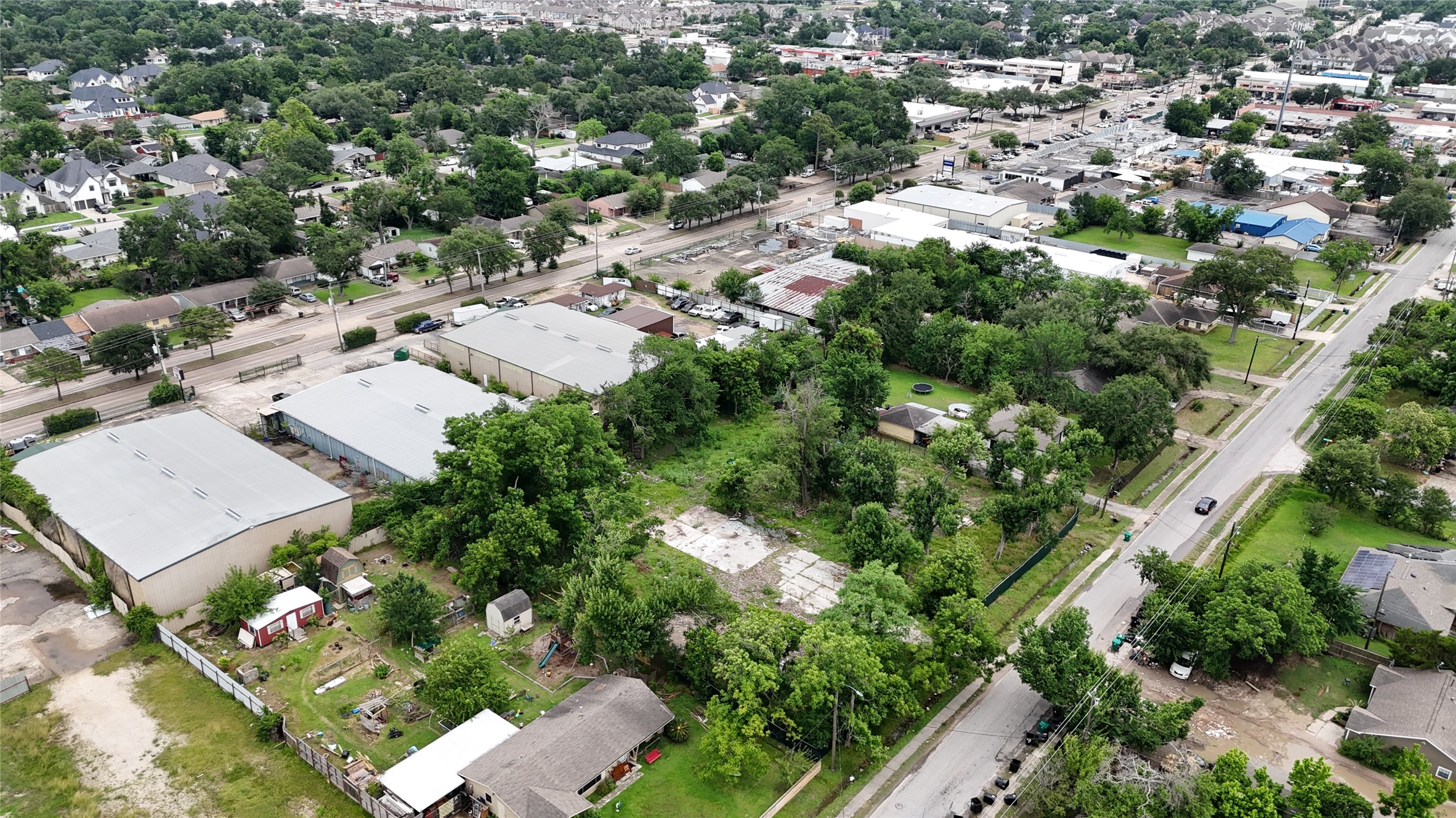 1926 Ojeman Road Houston, TX 77080 - Photo 6 of 22 an aerial view of residential houses with outdoor space and trees