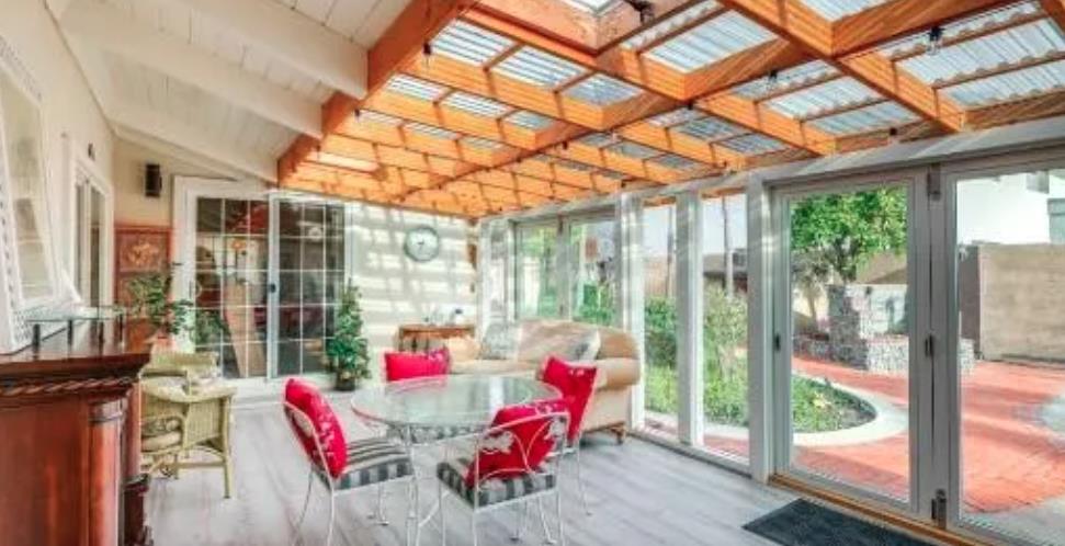 119 San Jose Street Salinas, CA 93901 - Photo 13 of 15 a living room with furniture and a floor to ceiling window