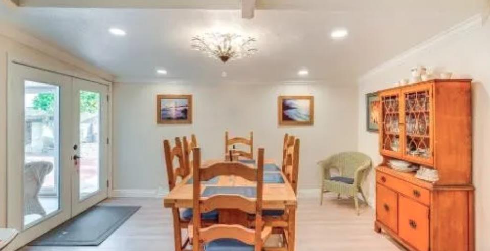 119 San Jose Street Salinas, CA 93901 - Photo 5 of 15 a view of a dining room with furniture and a chandelier