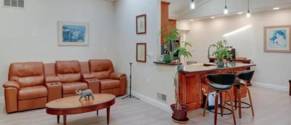 119 San Jose Street Salinas, CA 93901 - Photo 7 of 15 a living room with furniture and a wooden floor