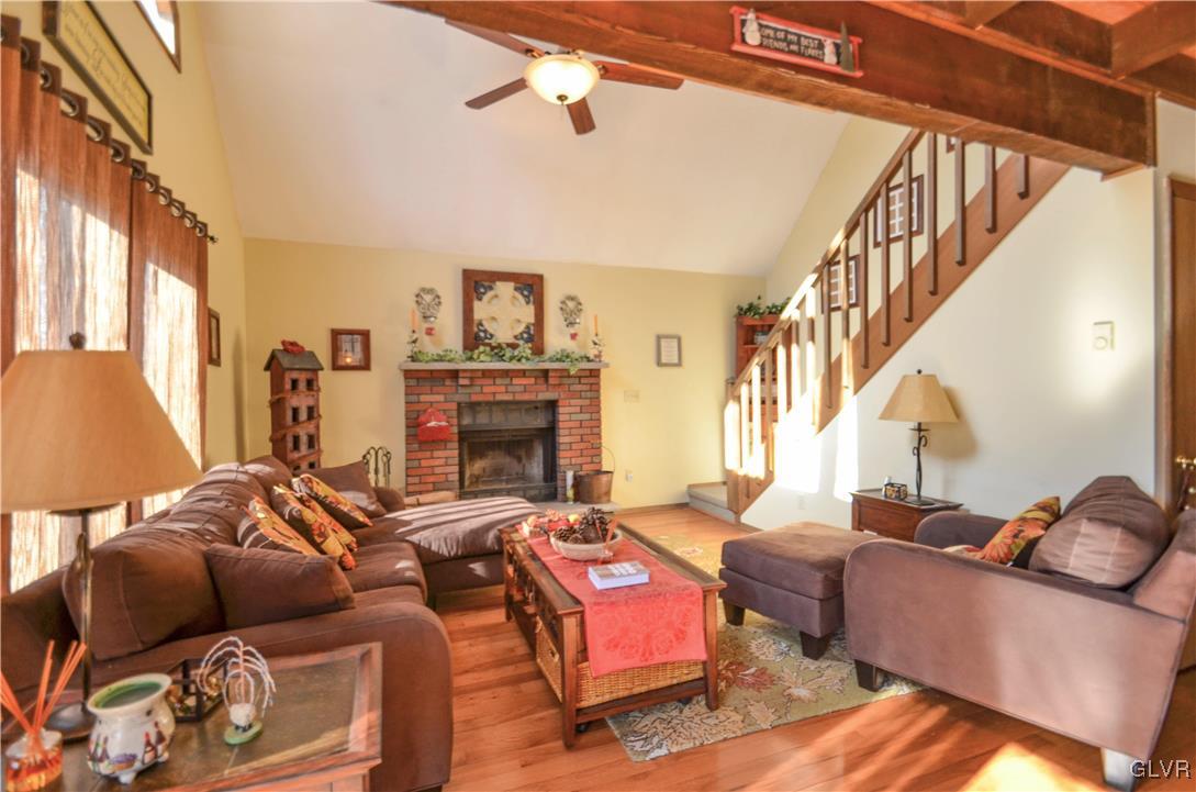 3231 Northgate Road Lake Ariel, PA 18436 - Photo 5 of 29 a living room with furniture fireplace and a window