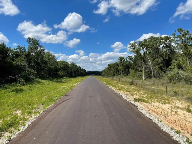 a view of a golf course with a garden
