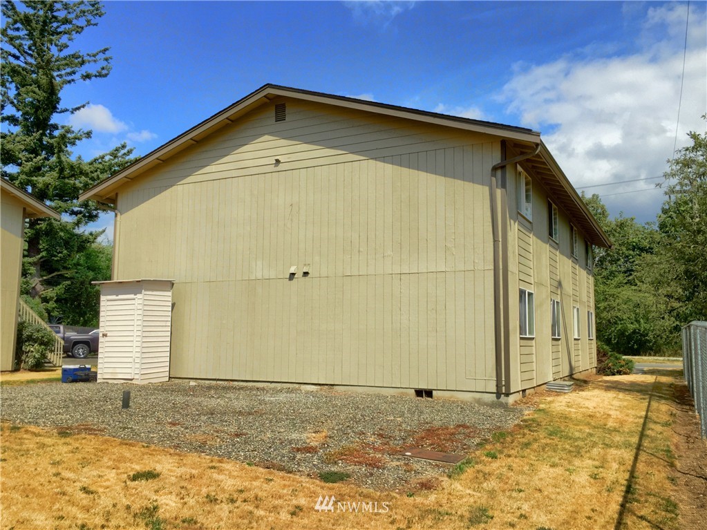 620 Everson Road, Unit 18 Everson, WA 98247 - Photo 14 of 14 a view of a house with a yard