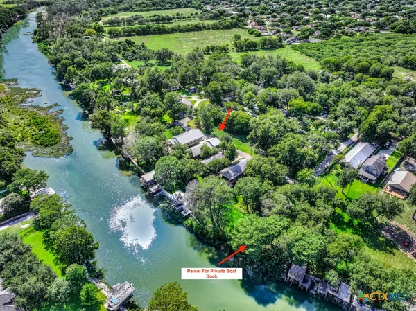 a view of a garden with a lot of flower plants and lots of green space