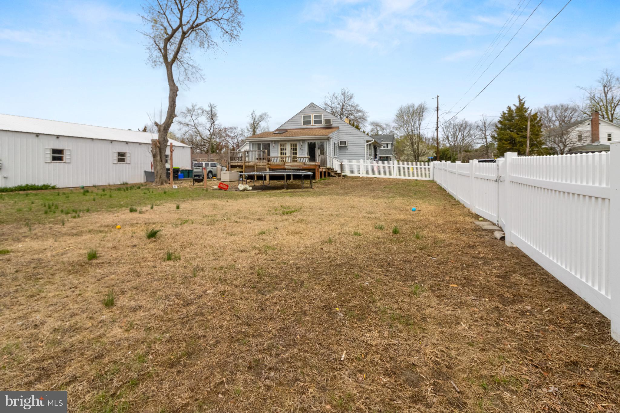 61 Franklin Avenue Clementon, NJ 08021 - Photo 29 of 32 a view of a house with a yard and sitting area