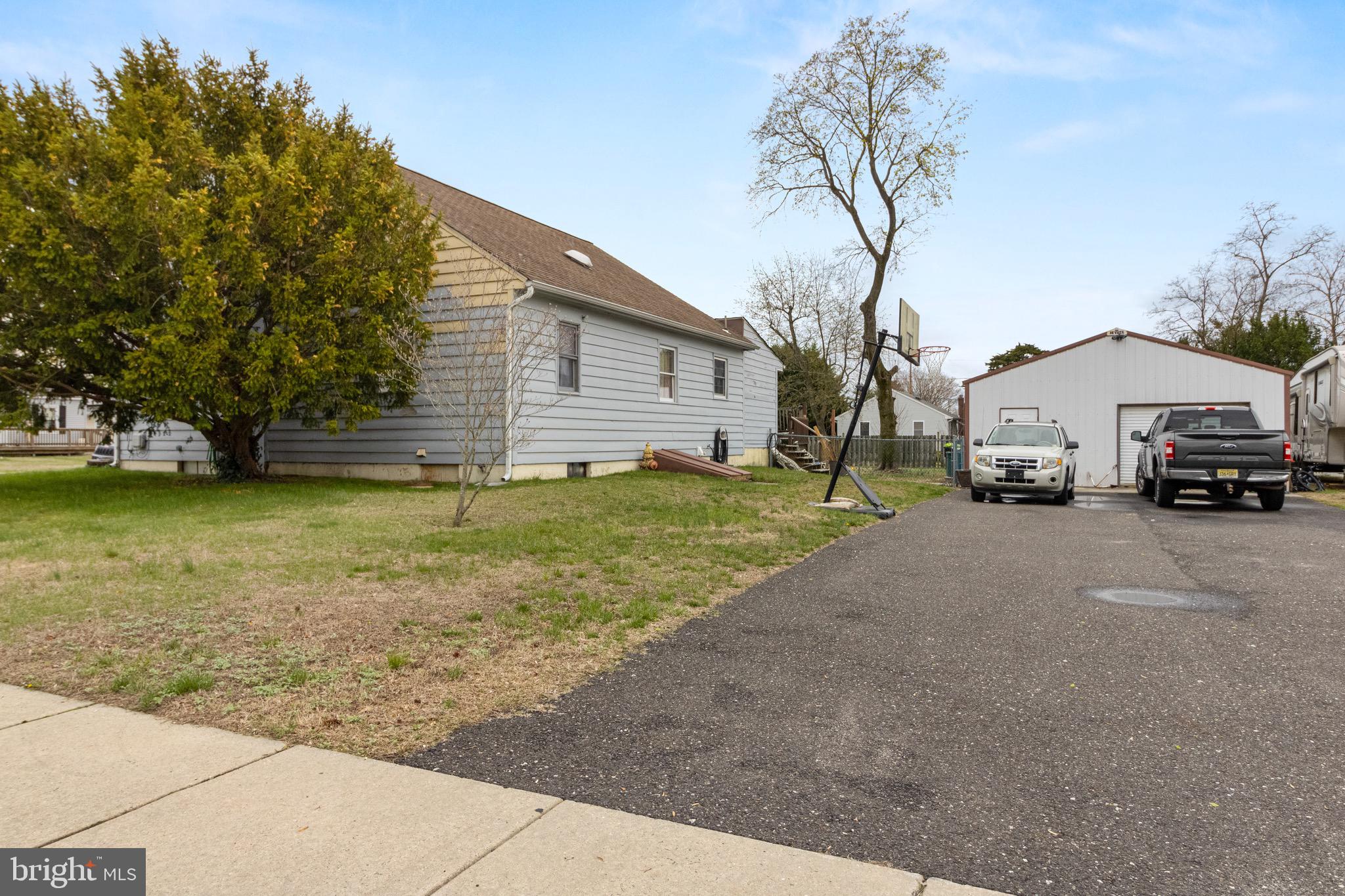 61 Franklin Avenue Clementon, NJ 08021 - Photo 3 of 32 a view of a car park in front of a house