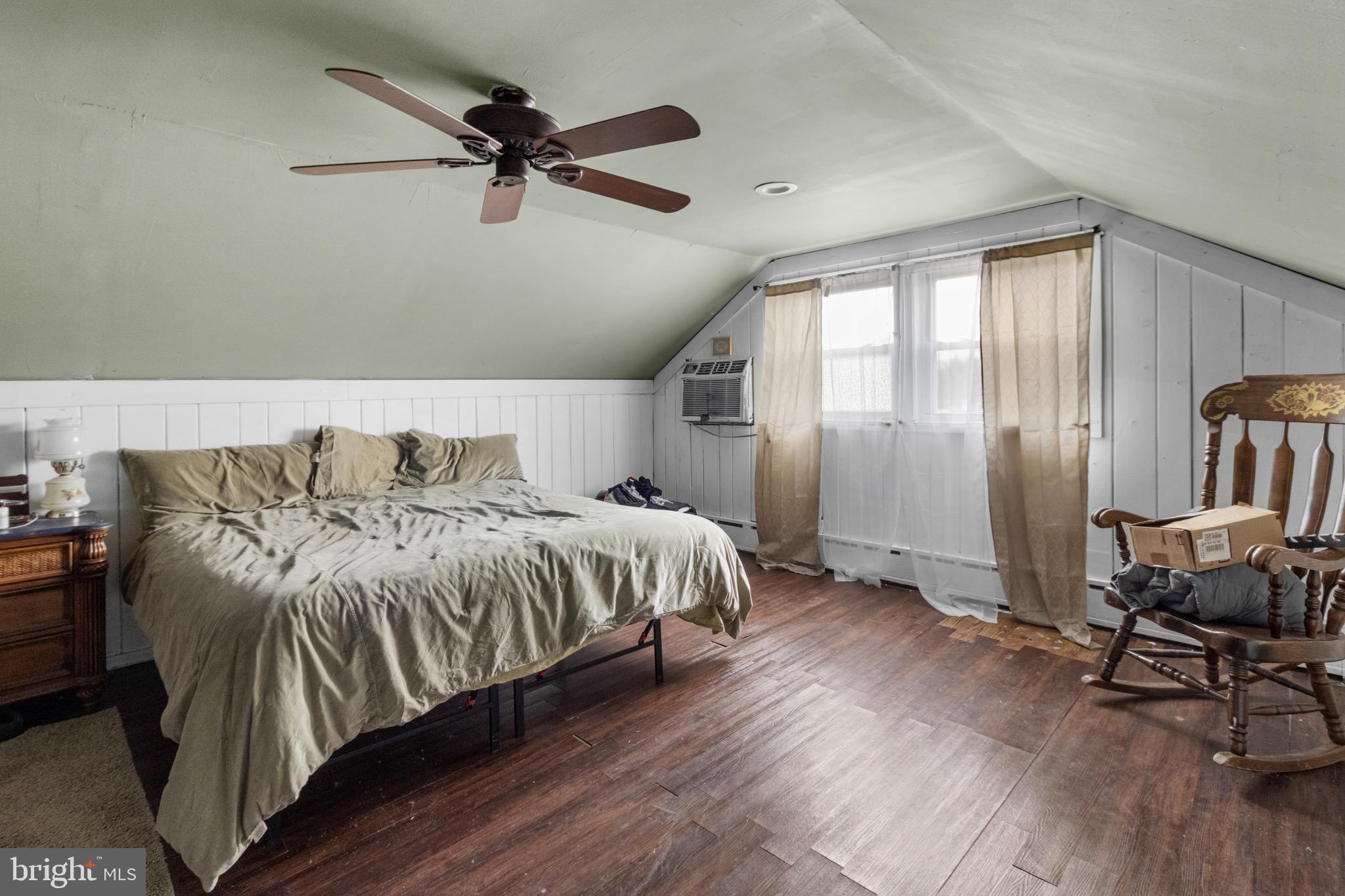 61 Franklin Avenue Clementon, NJ 08021 - Photo 10 of 32 a bedroom with a bed and glass door