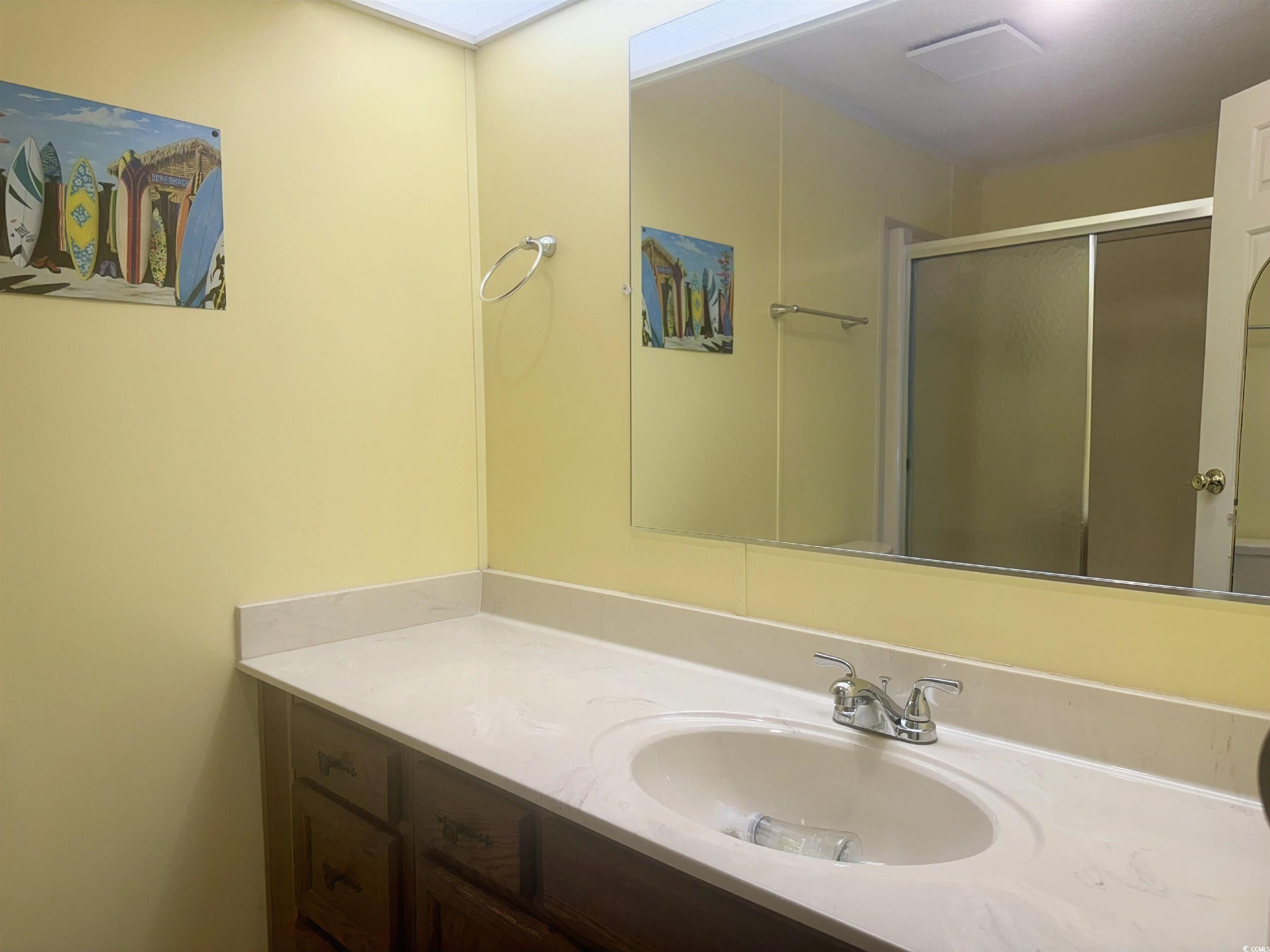1981 Morning Glory Surfside Beach, SC 29575 - Photo 12 of 22 Full bath with vanity and a stall shower