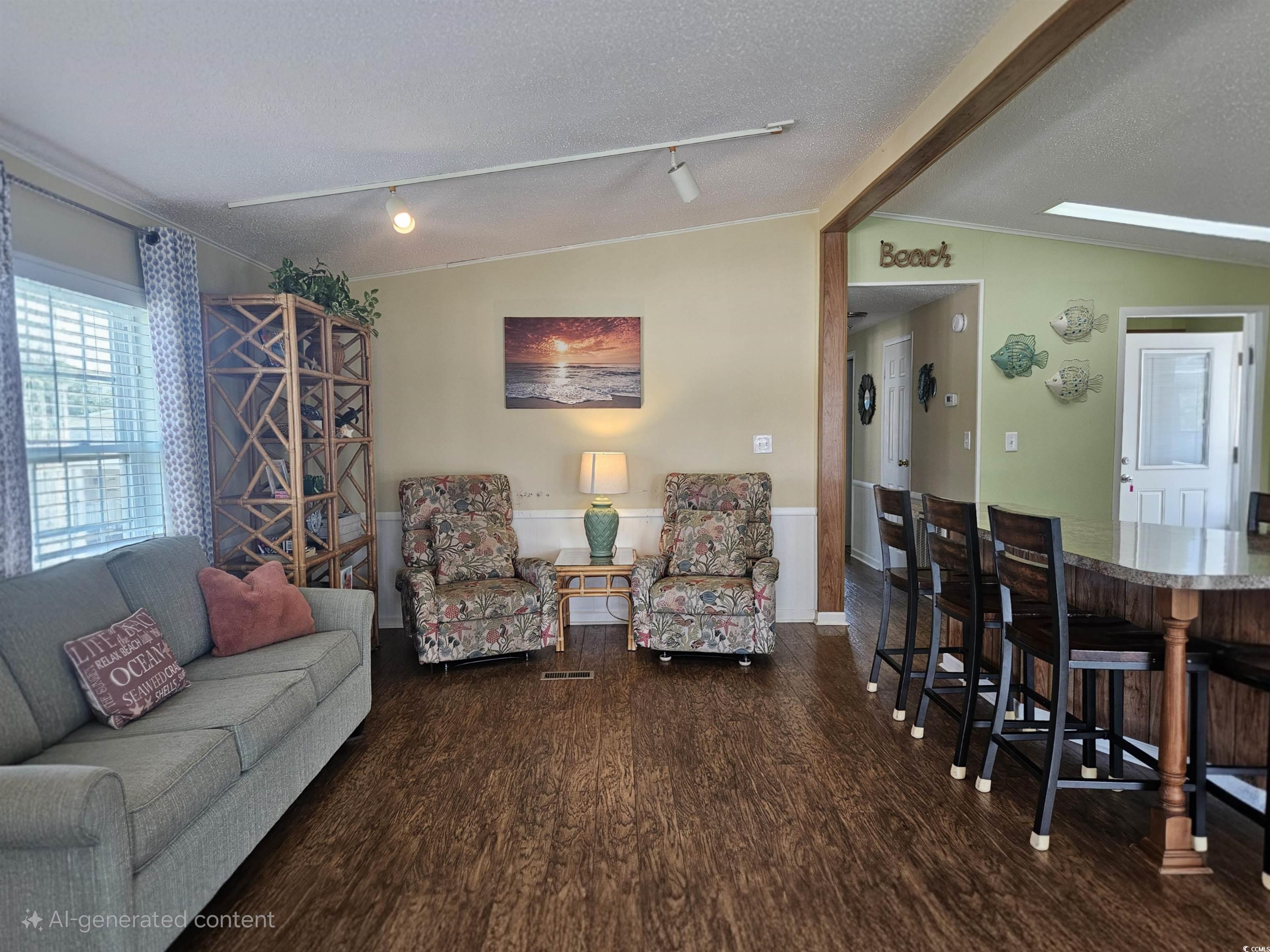 1981 Morning Glory Surfside Beach, SC 29575 - Photo 7 of 22 Living room with dark wood-style flooring, track lighting, a textured ceiling, ornamental molding, and vaulted ceiling