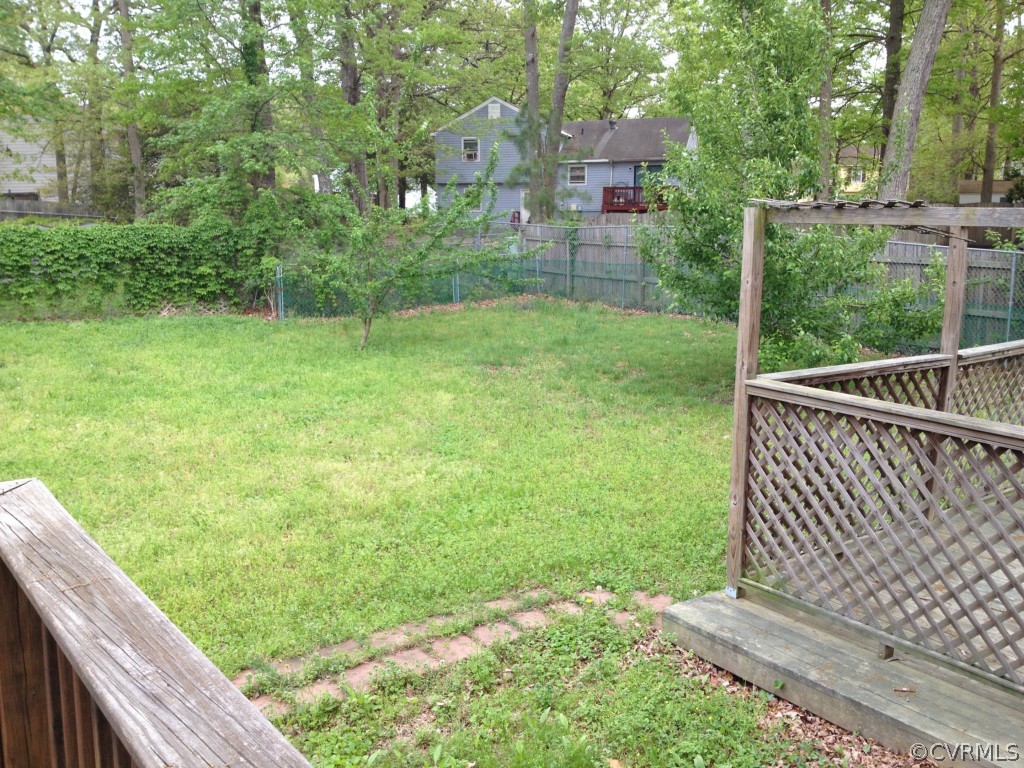 10531 Genlou Road Chesterfield, VA 23832 - Photo 15 of 17 a view of a backyard with a garden