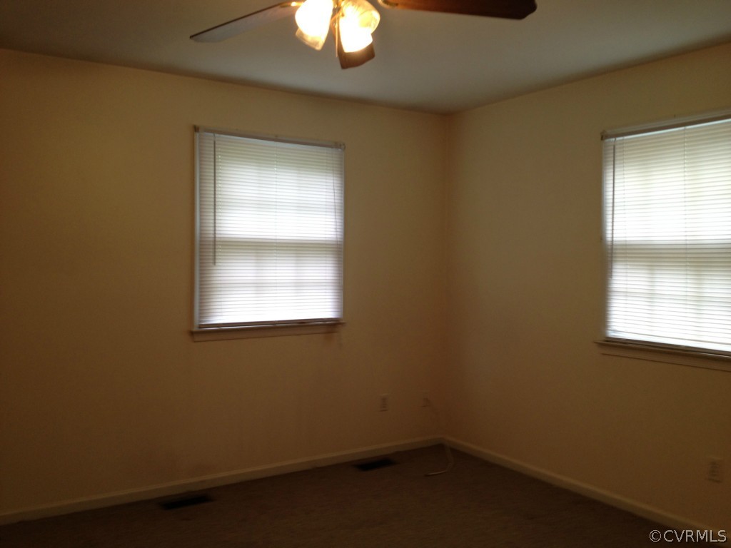 10531 Genlou Road Chesterfield, VA 23832 - Photo 7 of 17 an empty room with a window