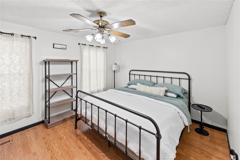 338 HCR 2124 Loop Whitney, TX 76692 - Photo 22 of 39 a bedroom with a bed and a window