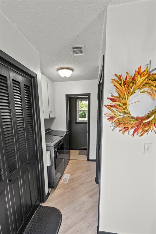 338 HCR 2124 Loop Whitney, TX 76692 - Photo 27 of 39 a view of a kitchen from the hallway