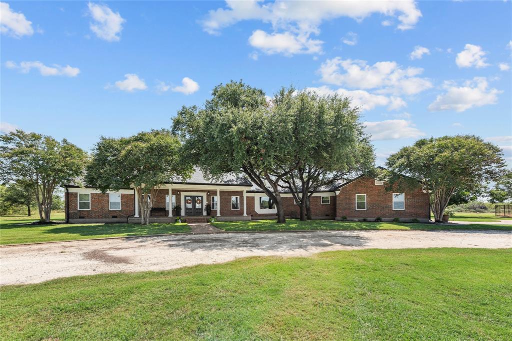 338 HCR 2124 Loop Whitney, TX 76692 - Photo 3 of 39 a view of house with yard in front of it