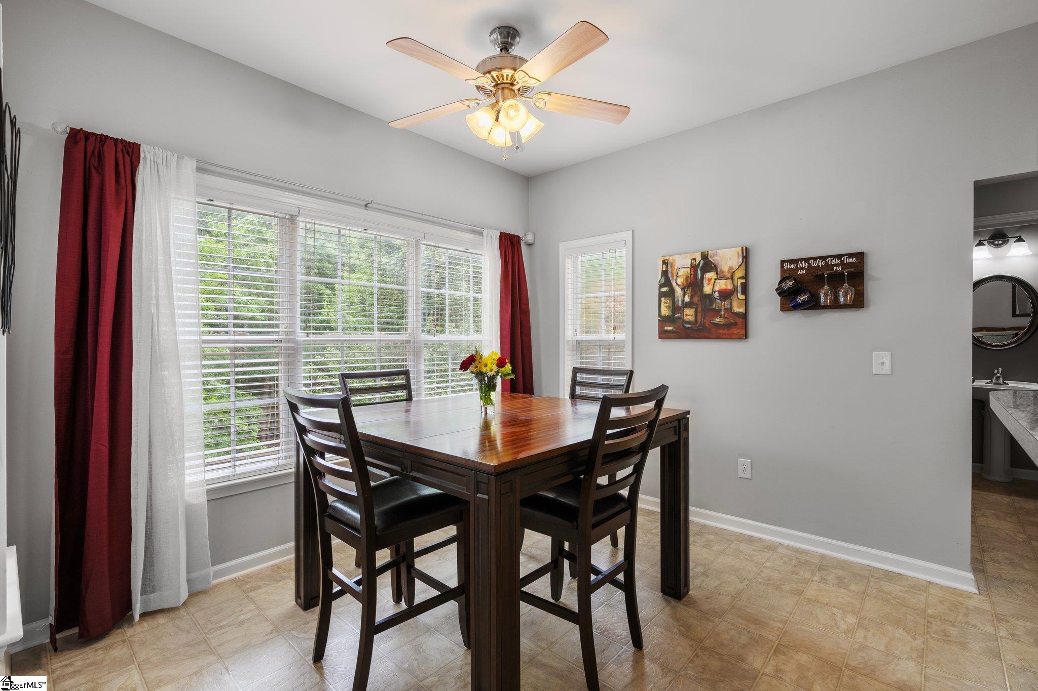 304 Grimes Drive Simpsonville, SC 29681 - Photo 13 of 36 Eat in Dining with view of yard