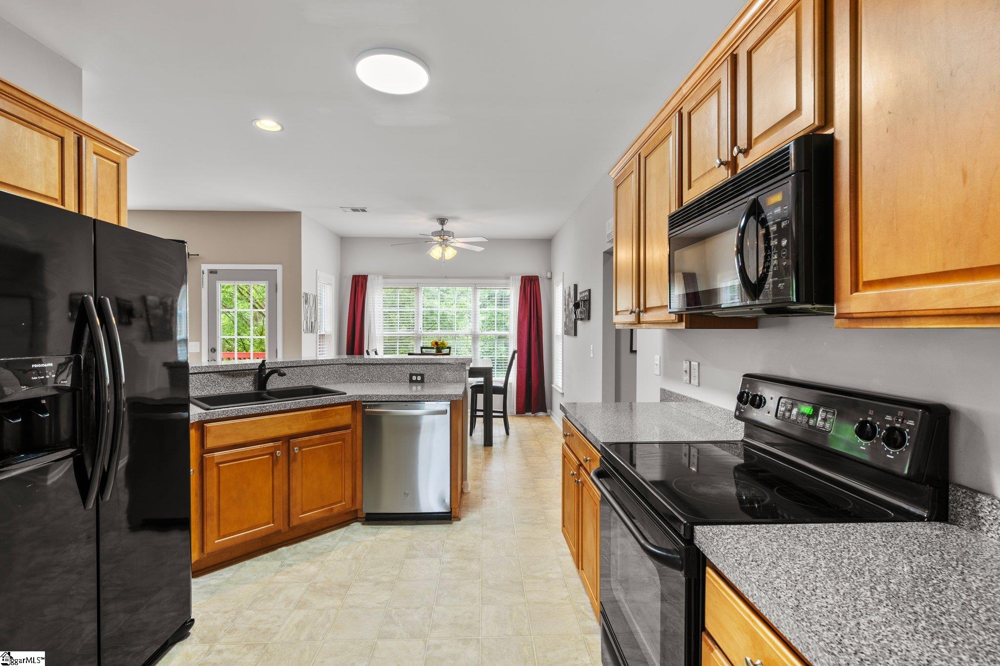 304 Grimes Drive Simpsonville, SC 29681 - Photo 16 of 36 Kitchen leading to eat in dining