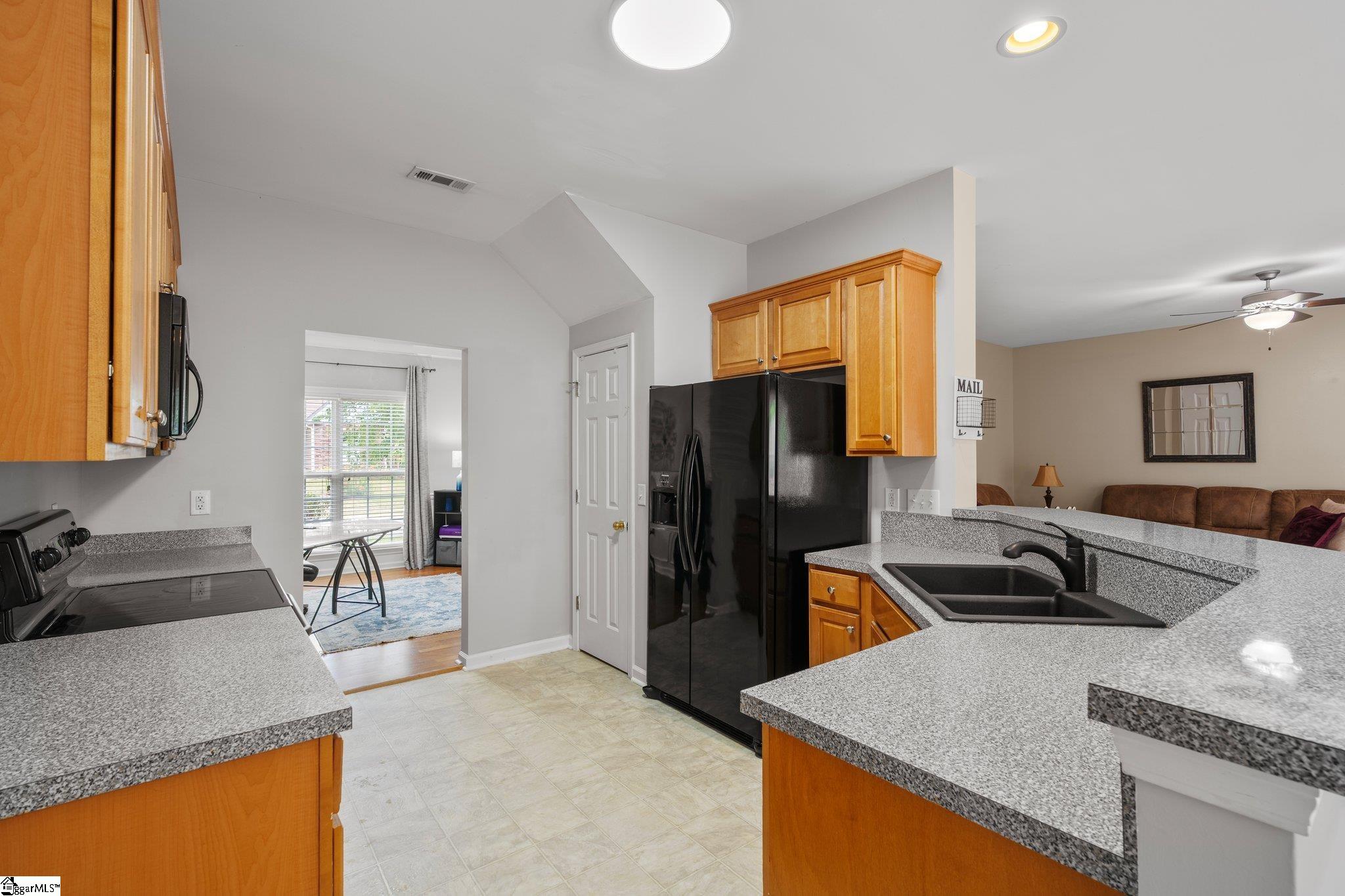 304 Grimes Drive Simpsonville, SC 29681 - Photo 17 of 36 Kitchen leading to dining room