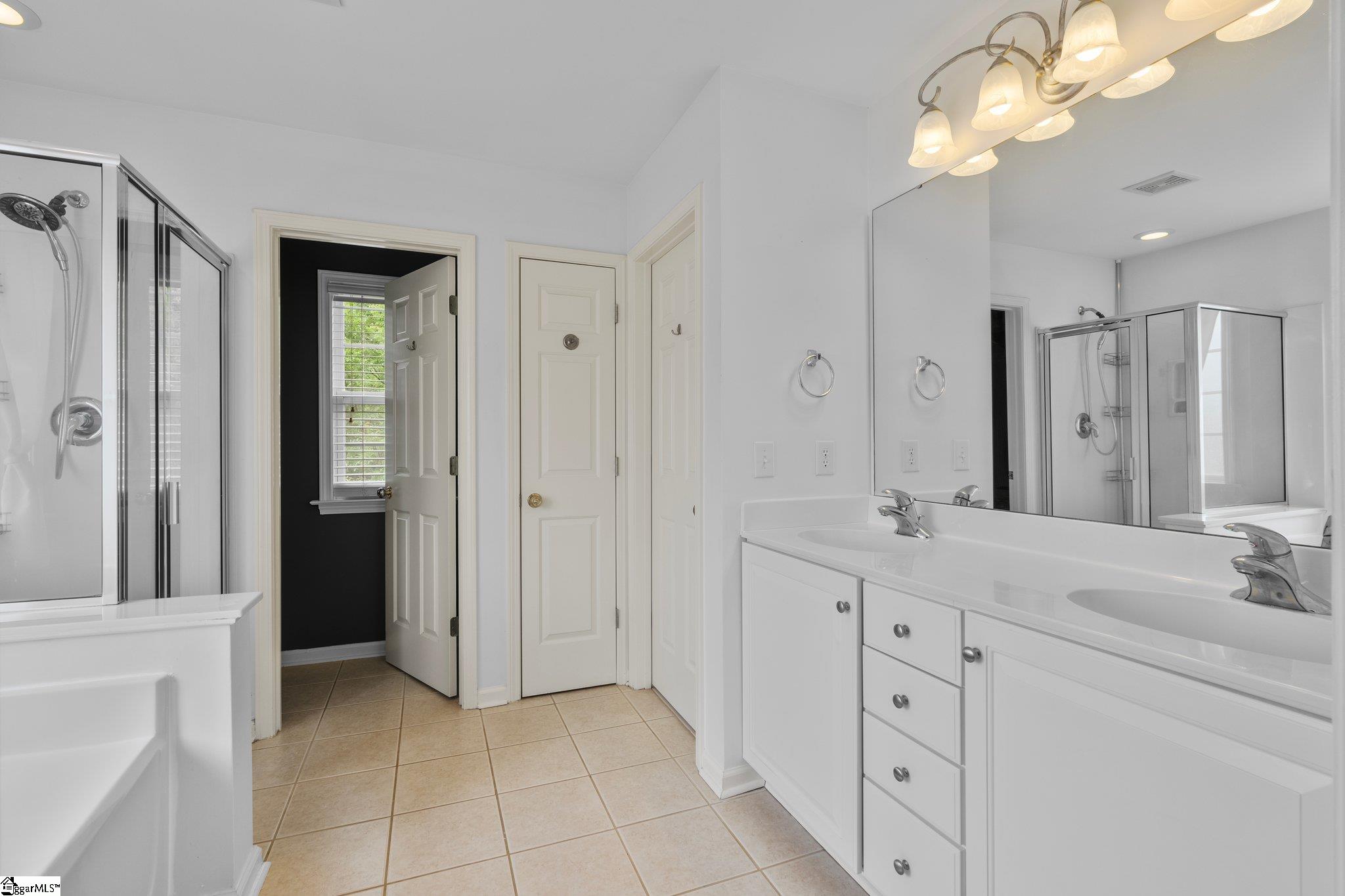 304 Grimes Drive Simpsonville, SC 29681 - Photo 22 of 36 Master Bath with Dual Vanities and walk in closet