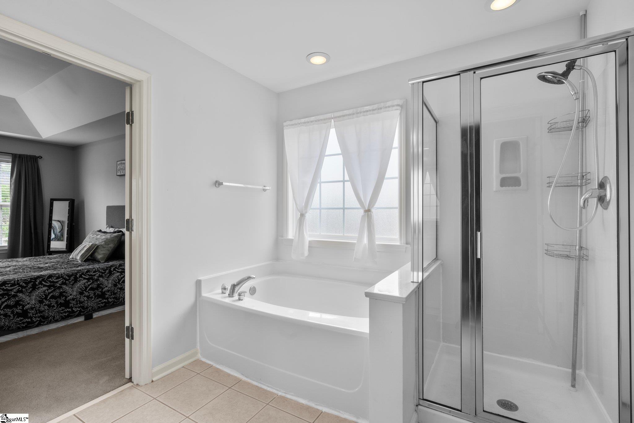 304 Grimes Drive Simpsonville, SC 29681 - Photo 23 of 36 Master Bath with soaker tub and stand up shower