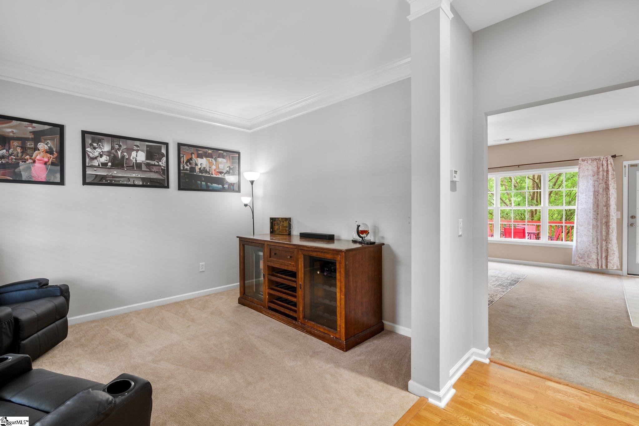 304 Grimes Drive Simpsonville, SC 29681 - Photo 9 of 36 Flex room leading to living room